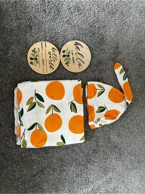 Newborn receiving blanket with matching hat and signs